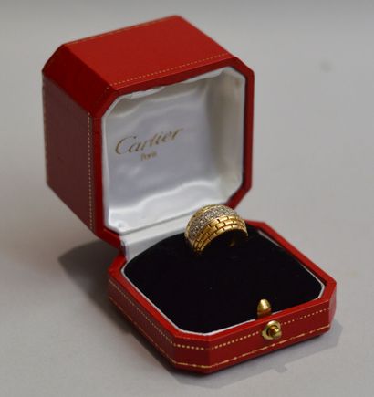 CARTIER
Two 750 thousandths gold ring with...