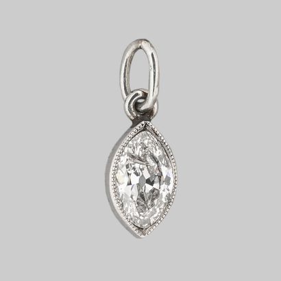null Platinum pendant set with a navette-cut diamond weighing approximately 0.80...