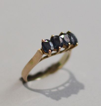 585 thousandths (14K) gold ring with 4 blue...