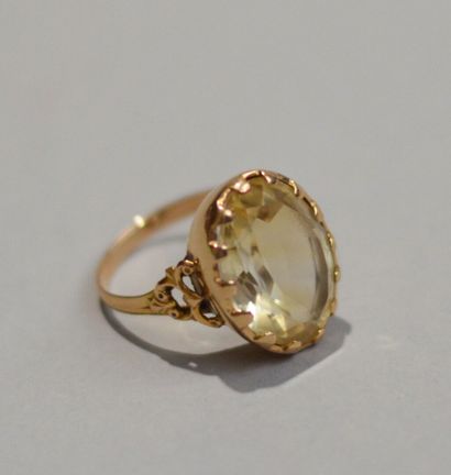 750 thousandths gold ring set with a citrine....
