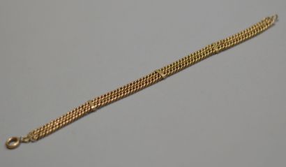 null Double-row gold bracelet 750 thousandths with gourmette link
Weight : 8,5 g