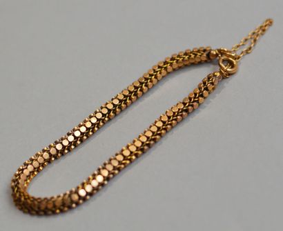 Fancy mesh bracelet in 750 thousandths gold...
