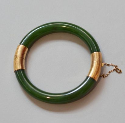 Green serpentine bracelet with 14K (585 thousandths)...
