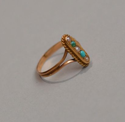 null 750 thousandths gold navette ring set with half cultured pearls and half green...