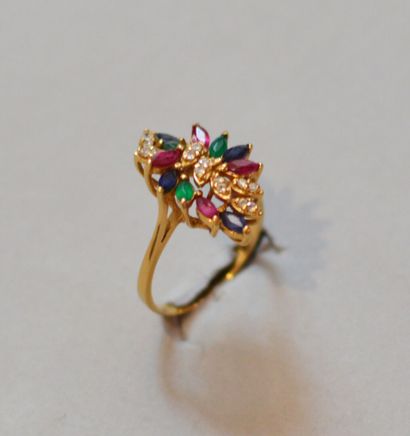 null 750 thousandths gold ring set with diamonds and sapphires, emeralds, navette-cut...