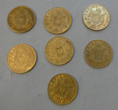 null FRANCE. 7 pièces de 20 francs or Napoléon III lauré (1852 A, 1855 A, 1860 BB)....