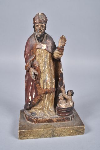 null Statuette en bois sculpté et polychromie représentant Saint-Nicolas debout sur...