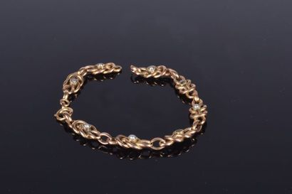 null Bracelet en or jaune à maille stylisée serti de petites perles (Accidents) (Pds...