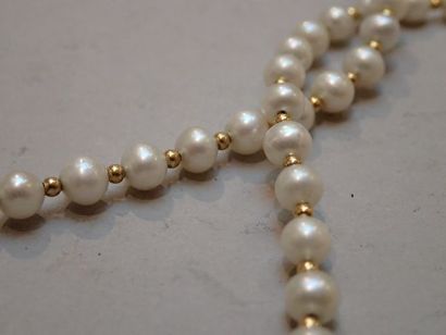 null Parure en perles de culture et or jaune comprenant un collier et un bracelet...