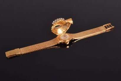 null BUCHERER 21 jewels made in Swiss, montre bracelet en or 18K à décor en applique...