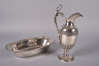 null TETARD Frères. Silver ewer and basin. The ewer decorated with friezes of pearls,...