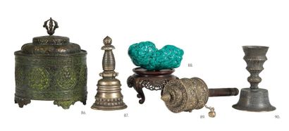 TIBET TIBET

Bronze stupa, the base decorated with a double frieze of lotus petals,...