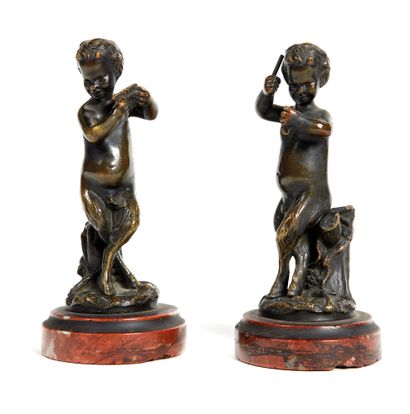 Deux satyres Two satyrs

in chased and gilded bronze playing the panpipes and the...