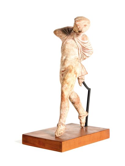 Statuette Statuette 

of a naked child in the attitude of the dance. He is holding...