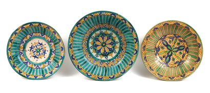 Three earthenware ghotar dishes with blue,...