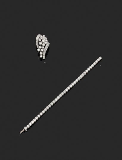 MAUBOUSSIN MAUBOUSSIN
Broche-clip en platine dessinant une gerbe, sertie de diamants...