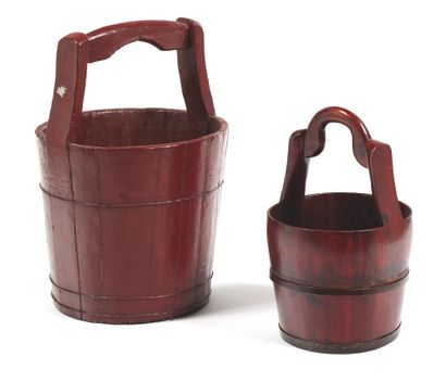 null Two tobacco lacquered natural wood bath buckets with handles, one circled with...