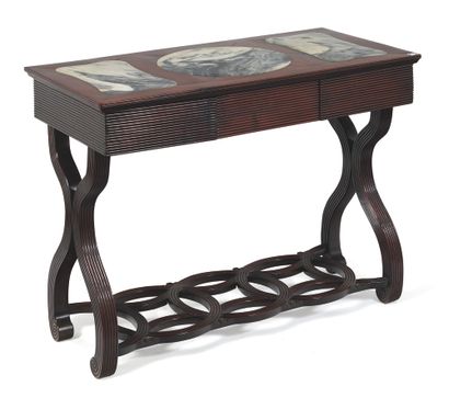 null Table
Rectangular table in molded ironwood. The top is decorated with three...