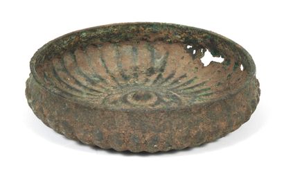 Tongue bowl and omphalos.
Bronze with green...