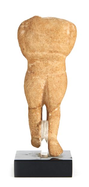 Headless idol with legs slightly bent and...
