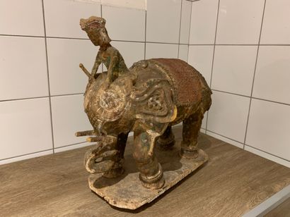 null Elephant and his mahout in carved and painted wood.
Indian work
Height 44 Long...