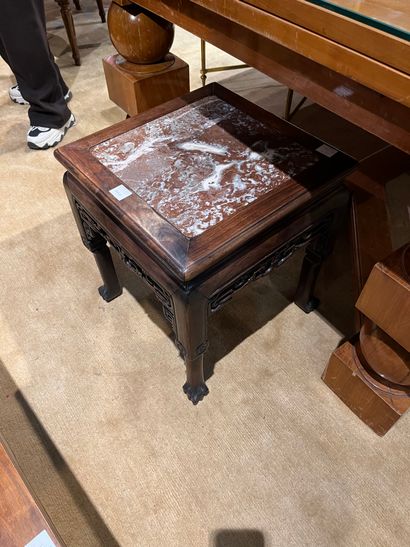 null Small square table in carved and openworked wood, marble top.
China, modern...