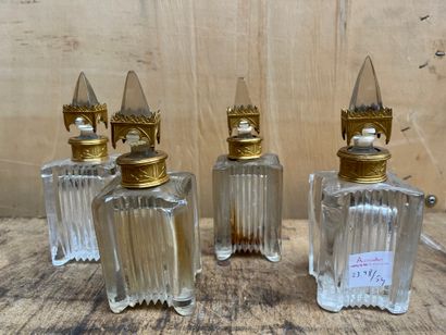 null Four neo-Gothic cut-crystal flasks with gilt-bronze mounts.
Late 19th century.
Height:...