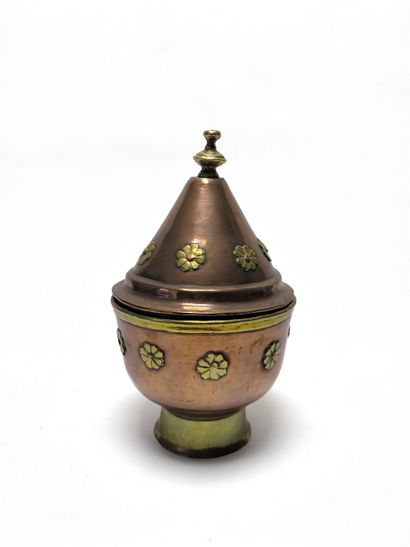 null Two-tone copper covered pot with applique flower design.
North Africa.
Height:...