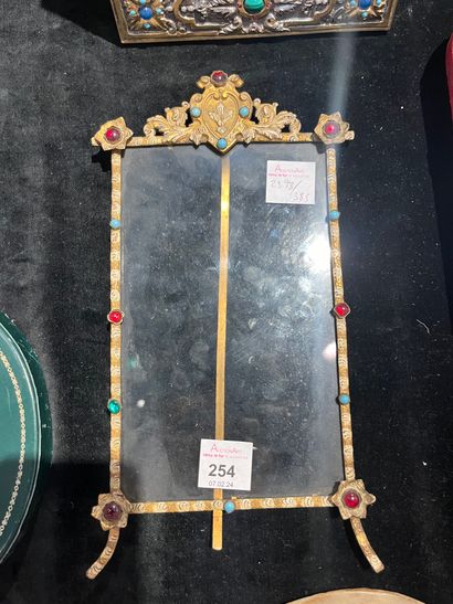 null Brass table frame decorated with foliage and flowers, partially enameled and...