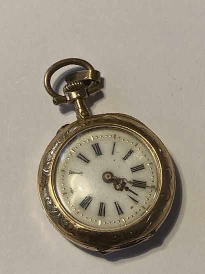 null ANCIENNE MONTRE DE COL

En or jaune 18K (750 millièmes) à décor de rinceaux...