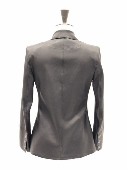 null Veste noire en cuir de chèvre, de la marque SCHIMMEL

Taille 38

100% cuir de...