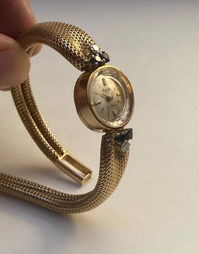 null ANCIENNE MONTRE BRACELET DE DAME
En or jaune 18K (750 millièmes), à cadran rond...