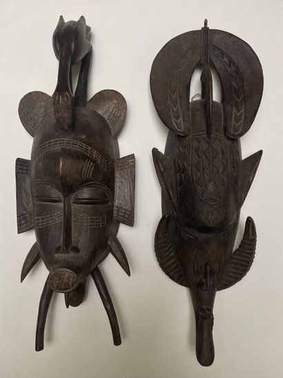 null SENOUFO - MALI (de type)
Deux masques dont l'un zoomorphe, les deux surmontés...