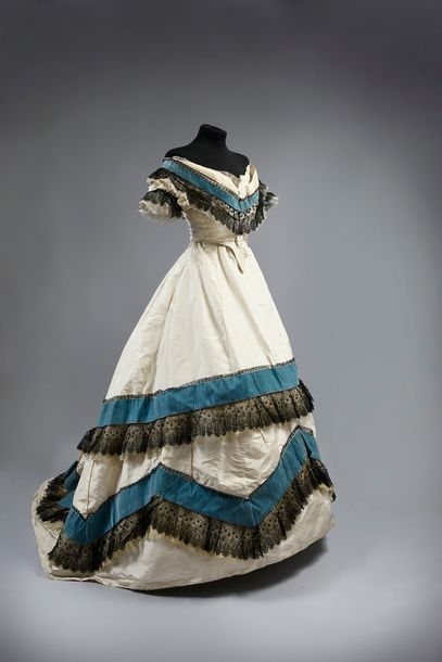 Ball gown, circa 1865, dress in cream silk...