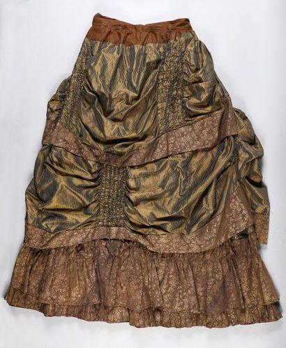null Daytime dress, circa 1885, in green striped taffeta and chamois and silk weave...