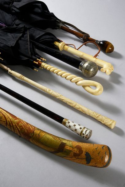 Set of five umbrellas circa 1900, two with...