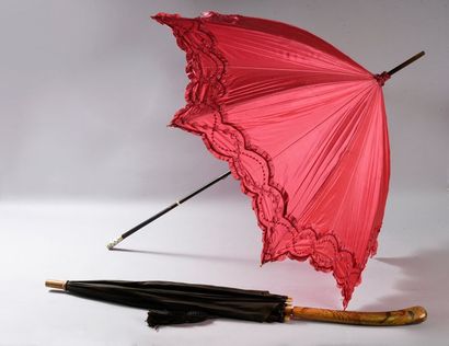 null Elegant umbrella, German work, circa 1900, the handle in exotic wood and brown...