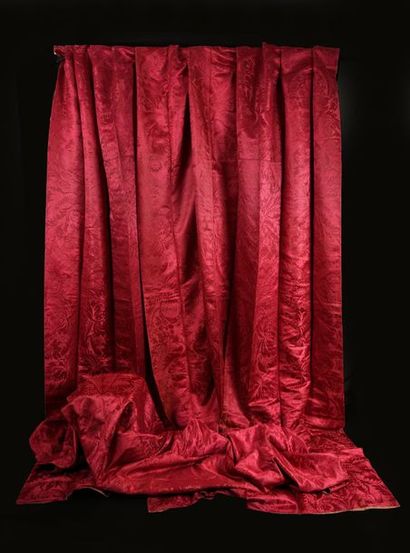 Pair of raspberry brocatelle curtains, first...