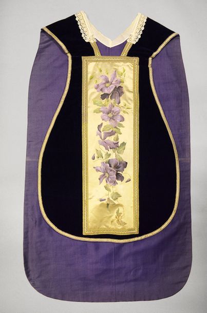 null Chasuble, circa 1900, purple velvet; orphreys painted on cream satin with clematis...
