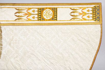 null Cream-coloured silk damask with cruciform fleurons decoration; bands of orphreys...