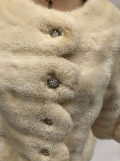 null CLAUDE GILBERT, three-quarter jacket in white mink, festoon closure and glass...