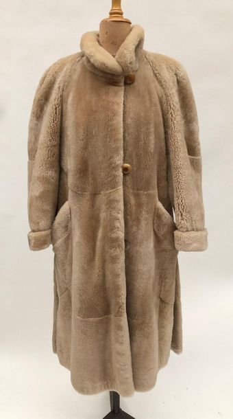 null CLAUDE GILBERT, beige guanaco coat, one button missing. Size 40. 