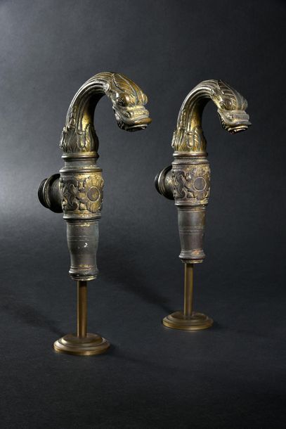 Pair of chased and gilt bronze taps, the...