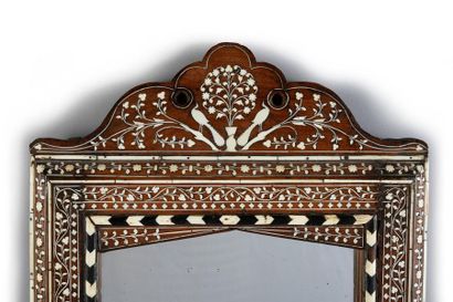 null Wooden mirror decorated with bone and ivory filets, flowers and peacock.
Indo-Portuguese...