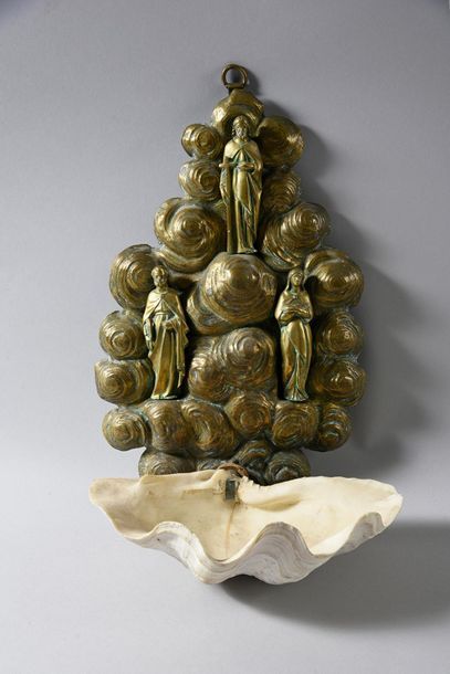 null Applique stoup in repoussé brass and shell, the plate chiselled with clouds...