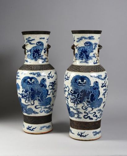 Nankin. 
An important pair of cracked stoneware vases in baluster shape with Buddhist...