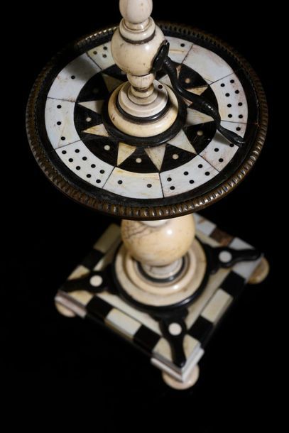 null Table turnstile or roulette wheel in ivory and ebony veneer, the square top...