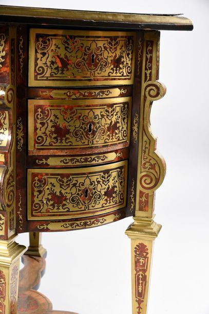 null Mazarin desk in inlaid brass Boulle type marquetry on a red-tinted tortoiseshell...