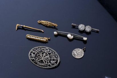 null Set of metal brooches including a plate brooch set with marcasites in the Louis...
