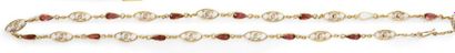 null Long necklace in 750e gold with filigree links decorated with garnet pears in...